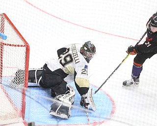 Phantoms Tommy Apap(21) pauses before shooting against Lumberjacks goalie Keith Petruzzelli(29) during the 2nd period as the Muskegon Lumberjacks take on the Youngstown Phantoms, Saturday, March 4, 2017 at the Covelli Centre. ..(Nikos Frazier | The Vindicator)..