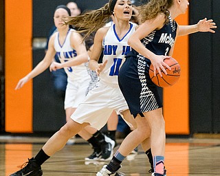 03-04-17 -Lady Basketball-  1st. qtr., Jackson-Milton's #11 Ashley Totani defends against McDonald's #3 Olivia Perry.  McDonald Devils vs Jackson-Milton Blue Jays at Mineral Ridge High School in Mineral Ridge, OH.