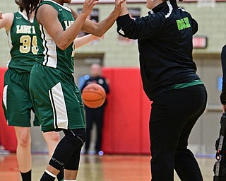 STRUTHERS, OHIO - MARCH 4, 2017: Dayshanette Harris #1 of Ursuline celebrates with head coach Vannessa Dickson after the final buzzer of their game Saturday afternoon at Struthers High School. DAVID DERMER | THE VINDICATOR