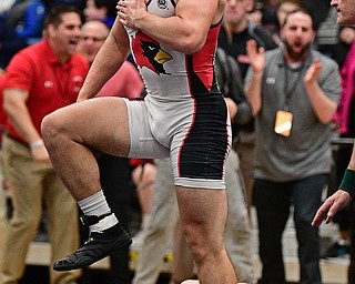 ALLIANCE, OHIO - MARCH 4, 2017: David Crawford of Canfield celebrates after beating David Heath of St. Vincent-St. Mary in super overtime during their 170lb championship bout Saturday night at Alliance High School. DAVID DERMER | THE VINDICATOR