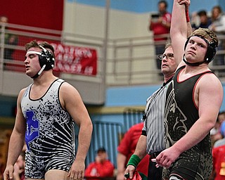 ALLIANCE, OHIO - MARCH 4, 2017: Dakota McCLOSKEY of Girard has his arm raised by the referee after winning his 3rd/4th place 120lb bout Saturday night at Alliance High School. DAVID DERMER | THE VINDICATOR