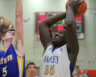 William D Lewis The Vindicator Valley's Fred Hicks(35) shoots over Jacob Joner(5) of Southern.