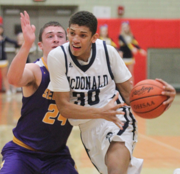 William D Lewis the Vindicator McDonald's Braedon Poole(30) drives past Sebring's Jarod Hunter(24)
