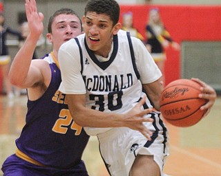 William D Lewis the Vindicator McDonald's Braedon Poole(30) drives past Sebring's Jarod Hunter(24)