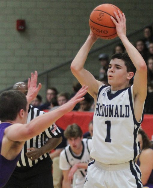 William D Lewis the Vindicator McDonald's Zach Rasile(1) looks ot pass during 3/7/17 action at Struthers.