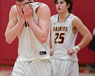 SALEM, OHIO - MARCH 7, 2017: Dan Ritter #11 of South Range reacts while walking off the court after the final buzzer after the second half of their game Tuesday night at Salem High School. DAVID DERMER | THE VINDICATOR
