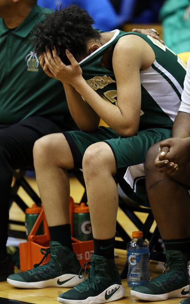 03-04-17 - D3 Regional Semi Girls Basketball-  Garfield G-Men vs Ursuline Irish at Cuyahoga Falls High School in Cuyahoga Falls, OH.  .4th. qtr., Ursuline's #32 Simone Comeris consoled on the bench as Garfield G-Men win the game.