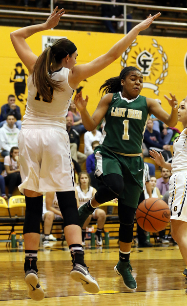 03-04-17 - D3 Regional Semi Girls Basketball-  Garfield G-Men vs Ursuline Irish at Cuyahoga Falls High School in Cuyahoga Falls, OH.  .1st.. qtr., Ursuline's #1 Datshanette Harris looses the ball as she drives against Garfield's #10 Grayson Rose