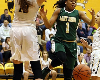 03-04-17 - D3 Regional Semi Girls Basketball-  Garfield G-Men vs Ursuline Irish at Cuyahoga Falls High School in Cuyahoga Falls, OH.  .1st.. qtr., Ursuline's #1 Datshanette Harris looses the ball as she drives against Garfield's #10 Grayson Rose