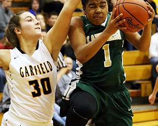 03-04-17 - D3 Regional Semi Girls Basketball-  Garfield G-Men vs Ursuline Irish at Cuyahoga Falls High School in Cuyahoga Falls, OH.  .4th. qtr., Ursuline's #1 Datshanette Harris drives against Garfield's #30 Nina Jurcevic