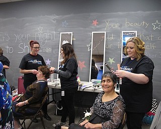 Neighbors | Alexis Bartolomucci.Guests at the Night to Shine Prom at Highway Tabernacle on Feb. 10 got their hair and make up done before the dance started.