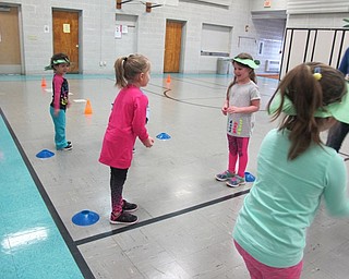 Neighbors | Alexis Bartolomucci.Students participated in a water balloon toss during their Olympics at North Preschool on Feb. 10.