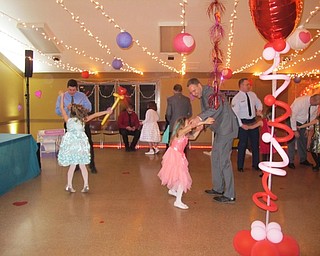 Neighbors | Alexis Bartolomucci.Fathers and daughters danced throughout the night during the Father Daughter Dance at Boardman Park on Feb. 16.