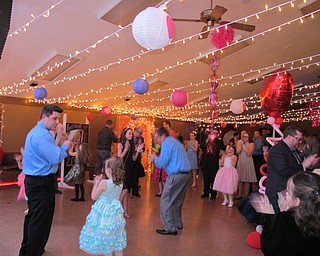 Neighbors | Alexis Bartolomucci.Fathers and daughters did the "Chicken Dance" during the annual Father Daughter Dance at Boardman Park on Feb. 16.