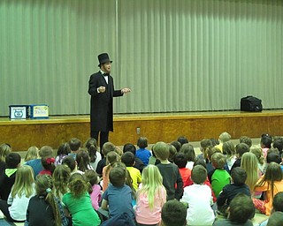 Neighbors | Alexis Bartolomucci.Actor Richard Waddingham put on a presentation as Abraham Lincoln for the students at Poland Union on Feb. 15.