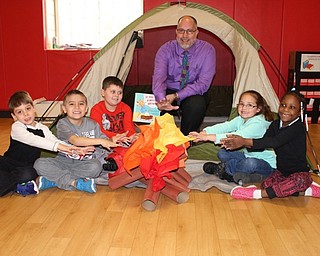 Neighbors | Submitted.Pictured are the lucky students that won a campfre story time with their principal, from left, Bryce Freudenberg, Enrique Martinez, Chris Johnson, Principal Tom Lenton, Alexia Little and Amireona Mcllwain.