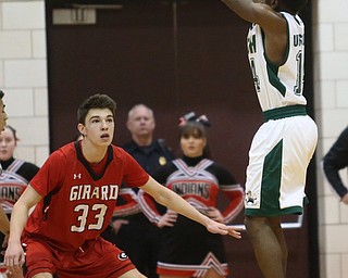 Dakota Hobbs(14) of Ursuline goes up for three during the 1st quarter as Girard takes on Ursuline, Thursday, March 9, 2017 at Boardman High School. Ursuline won 62-53...(Nikos Frazier | The Vindicator)..