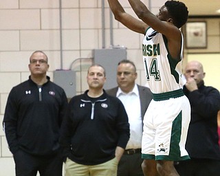 Dakota Hobbs(14) of Ursuline goes up for three during the 1st quarter as Girard takes on Ursuline, Thursday, March 9, 2017 at Boardman High School. Ursuline won 62-53...(Nikos Frazier | The Vindicator)..