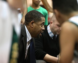 Ursuline head coach Keith Guntler talks with his players between quarters as Girard takes on Ursuline, Thursday, March 9, 2017 at Boardman High School. Ursuline won 62-53...(Nikos Frazier | The Vindicator)..
