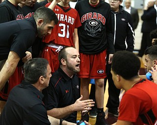 Girard head coach Craig Hannon talks with his players between quarters as Girard takes on Ursuline, Thursday, March 9, 2017 at Boardman High School. Ursuline won 62-53...(Nikos Frazier | The Vindicator)..