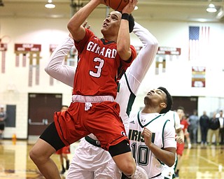 Anthony Backus(3) of Girard goes up for a layup during the 2nd quarter as Girard takes on Ursuline, Thursday, March 9, 2017 at Boardman High School. Ursuline won 62-53...(Nikos Frazier | The Vindicator)..