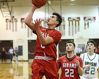 Austin Clausell(2) of Girard goes up for two during the 2nd quarter as Girard takes on Ursuline, Thursday, March 9, 2017 at Boardman High School. Ursuline won 62-53...(Nikos Frazier | The Vindicator)..