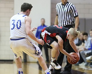Garrett Dickery(2) of Salem attempts to keep the ball in play during the 1st half as Salem takes on Poland Seminary, Thursday, March 9, 2017 at Boardman High School. Salem won 70-66...(Nikos Frazier | The Vindicator)..