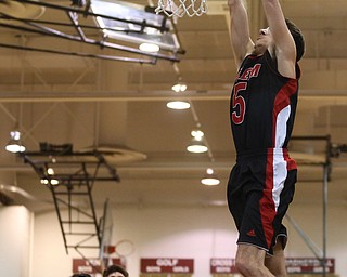 Jon Gerace(5) of Salem dunks the ball during the 1st half as Salem takes on Poland Seminary, Thursday, March 9, 2017 at Boardman High School. Salem won 70-66...(Nikos Frazier | The Vindicator)..