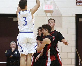 Braeden O'Shaungnessy(3) of Poland goes up for three during the 1st half as Salem takes on Poland Seminary, Thursday, March 9, 2017 at Boardman High School. Salem won 70-66...(Nikos Frazier | The Vindicator)..