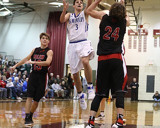 Braeden O'Shaungnessy(3) of Poland goes up for a layup during the 2nd half as Salem takes on Poland Seminary, Thursday, March 9, 2017 at Boardman High School. Salem won 70-66...(Nikos Frazier | The Vindicator)..