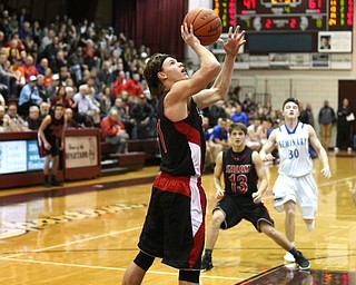 Turner Johnson(11) of Salem goes up for a layup during the 2nd half as Salem takes on Poland Seminary, Thursday, March 9, 2017 at Boardman High School. Salem won 70-66...(Nikos Frazier | The Vindicator)..