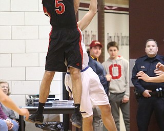 Jon Gerace(5) of Salem goes up for the rebound during the 2nd half as Salem takes on Poland Seminary, Thursday, March 9, 2017 at Boardman High School. Salem won 70-66...(Nikos Frazier | The Vindicator)..