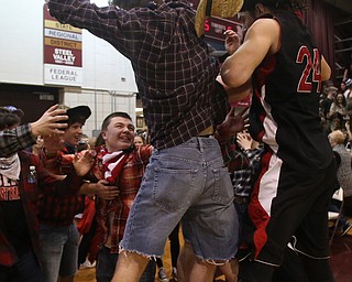 Salem celebrates after a 70-66 victory over Poland Seminary, Thursday, March 9, 2017 at Boardman High School. ..(Nikos Frazier | The Vindicator)..
