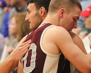 William D Lewis The Vindicator  Boardman's Austin Barone(11), left, and Coleman Stouffer(20) embrace after loss to Lake.