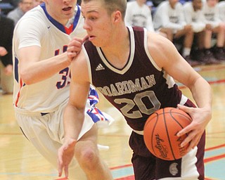 William D Lewis the Vindicator  Boardman'sColeman Stouffer(20) ) drives around Lakes Adam Hall ()350.