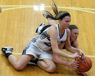 03-09-17 -Girls Basketball-  4th. qtr., Jackson-Milton's #22 Michaelina Terranova and Dalton's #21 Kelsey Shoup go for the loose ball.  Dalton Bulldogs vs Jackson-Milton Blue Jays at Perry High School in Massillon, OH.