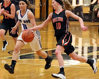 03-09-17 -Girls Basketball-  4th. qtr., Jackson-Milton's #11 Ashley Totani has the ball stolen from her byt Dalton's #10 Caitlyn Huth.  Dalton Bulldogs vs Jackson-Milton Blue Jays at Perry High School in Massillon, OH.