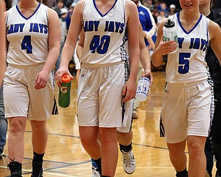 03-09-17 -Girls Basketball-  AFter their victory, Jackson-Milton's #4 Taylor Hayes, #40 Abigail Spalding and #5 Haley Lengyl walk off the court happy.  Dalton Bulldogs vs Jackson-Milton Blue Jays at Perry High School in Massillon, OH.