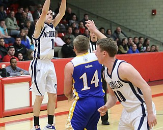 Zach Rasile(1) of McDonald goes up for three during the 1st quarter as Southern Local takes on McDonald, Friday, March 10, 2017 at Struthers High School. McDonald won 96-43...(Nikos Frazier | The Vindicator)..