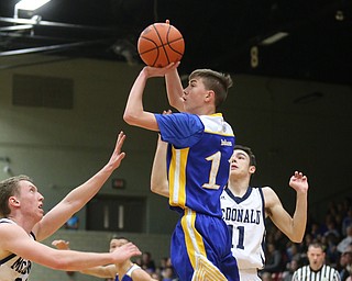 Max Hart(11) of Southern goes up for two during the 2nd quarter as Southern Local takes on McDonald, Friday, March 10, 2017 at Struthers High School. McDonald won 96-43...(Nikos Frazier | The Vindicator)..