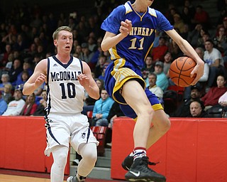 Max Hart(11) of Southern jumps to keep the ball in play during the 2nd quarter as Southern Local takes on McDonald, Friday, March 10, 2017 at Struthers High School. McDonald won 96-43...(Nikos Frazier | The Vindicator)..