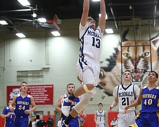 Dylan Portolese(13) of McDonald goes up for a break-away layup during the 3rd quarter as Southern Local takes on McDonald, Friday, March 10, 2017 at Struthers High School. McDonald won 96-43...(Nikos Frazier | The Vindicator)..