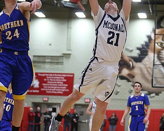 Joe Ragazzine(21) of McDonald reaches up for two during the 3rd quarter as Southern Local takes on McDonald, Friday, March 10, 2017 at Struthers High School. McDonald won 96-43...(Nikos Frazier | The Vindicator)..