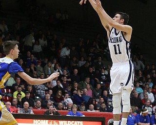 Caleb Emerson(11) of McDonald goes up for three during the 4th quarter as Southern Local takes on McDonald, Friday, March 10, 2017 at Struthers High School. McDonald won 96-43...(Nikos Frazier | The Vindicator)..