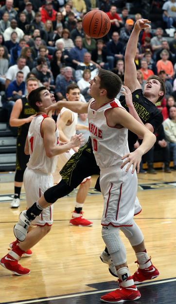 MICHAEL G TAYLOR | THE VINDICATOR- 03-10-17  -Basketball-  4th qtr., Garfield's #24 Ryan Brown drives against Labrae's #10 Logan Kiser. Boys high School basketball Garfield G-Men vs Labrae Vikings D3 Distric Finals at Warren G. Harding High School, Warren, OH