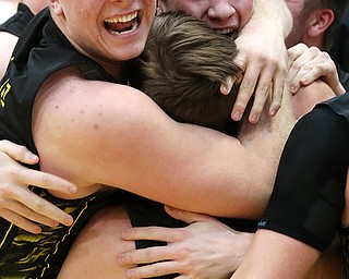 MICHAEL G TAYLOR | THE VINDICATOR- 03-10-17  -Basketball-   After winning the district final, Garfield celebrates. Boys high School basketball Garfield G-Men vs Labrae Vikings D3 Distric Finals at Warren G. Harding High School, Warren, OH