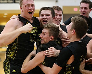 MICHAEL G TAYLOR | THE VINDICATOR- 03-10-17  -Basketball-   After winning the district final, Garfield celebrates. Boys high School basketball Garfield G-Men vs Labrae Vikings D3 Distric Finals at Warren G. Harding High School, Warren, OH