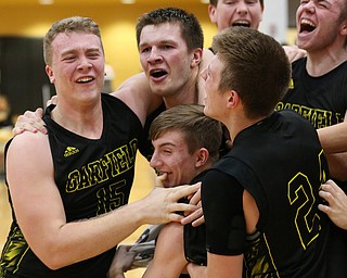 MICHAEL G TAYLOR | THE VINDICATOR- 03-10-17  -Basketball-   After winning the district final, Garfield celebrates. Boys high School basketball Garfield G-Men vs Labrae Vikings D3 Distric Finals at Warren G. Harding High School, Warren, OH