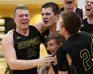 MICHAEL G TAYLOR | THE VINDICATOR- 03-10-17  -Basketball-   After winning the district final, Garfield celebrates. Boys high School basketball Garfield G-Men vs Labrae Vikings D3 Distric Finals at Warren G. Harding High School, Warren, OH