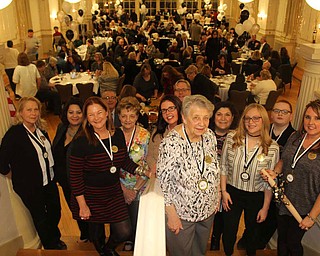 SPECIAL TO THE VINDICATOR
Mahoning Valley Historical Society recently announced the winners of its fifth annual cookie baking contest as part of Cookie Table & Cocktails that took place Feb. 25. More than 60 bakers participated and entries were judged by community leaders. Category winners are Trevor Jorgenson, youngest baker; Mary Carano and Philomena Tiberio, oldest bakers; Marnie Holcomb, best traditional cookie; Leah Bortz, best twist on a traditional cookie; Christine Burlock, best chocolate cookie; and Shellie DelSignore, best decorated cookie. In the professional division, Holcomb was the overall winner receiving the Judge’s Choice award; Susan Cabot placed first, Christina Benton, second; and Rikki Lynn Winger, third. Tysa Egleton won the Judge’s Choice award in the amateur section, Bortz placed first, Deb Nagy, second, and Rachelle Benchwick, third. In front from left are Benchwick, Egleton, Nagy, DelSignore, Winger, Tiberio, Mary Carano’s daughter, Bortz, Jorgenson and Holcomb.